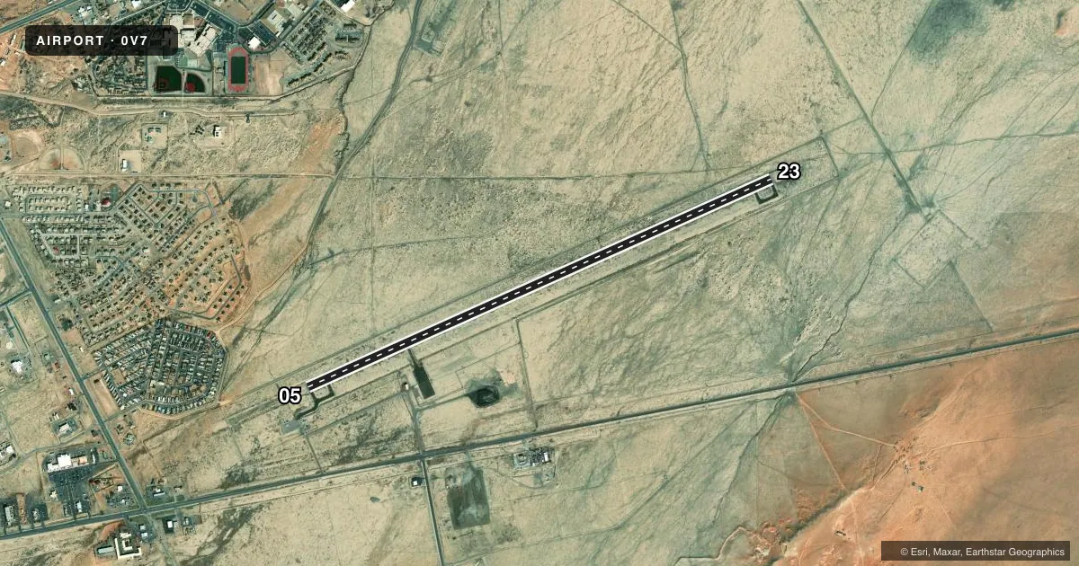 Top-down satellite sketch of 0V7 KAYENTA in KAYENTA, ARIZONA, showing runways 05/23 drawn to scale over Esri World Imagery