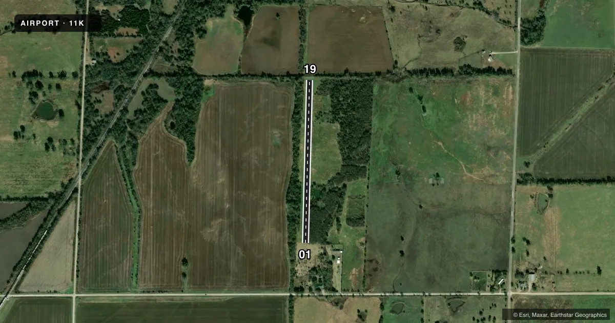Top-down satellite sketch of 11K SQUADRON FLD in ERIE, KANSAS, showing runways 01/19 drawn to scale over Esri World Imagery