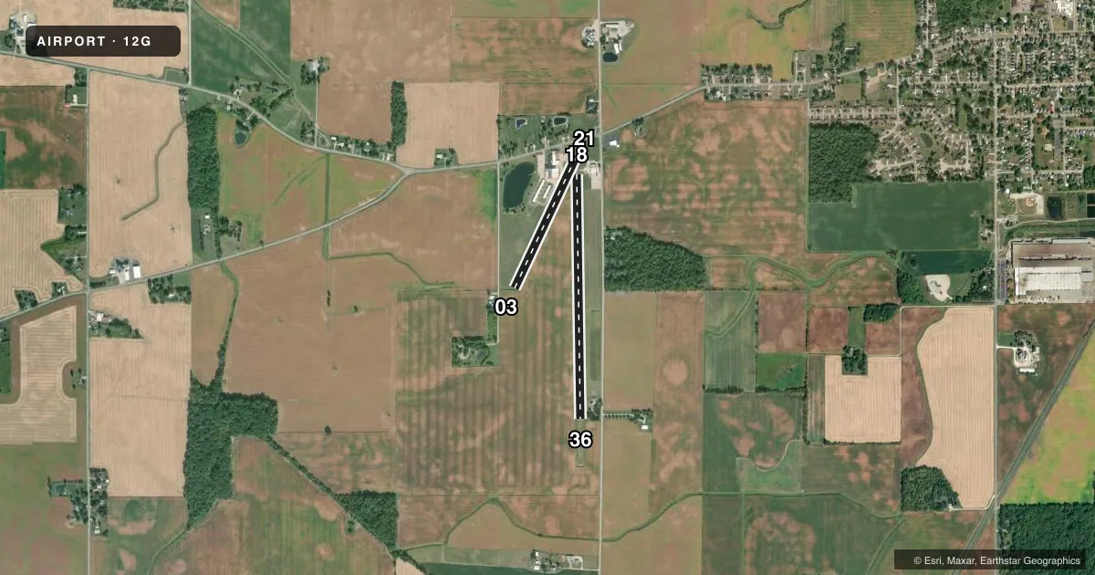 Top-down satellite sketch of 12G SHELBY COMMUNITY in SHELBY, OHIO, showing runways 18/36, 03/21 drawn to scale over Esri World Imagery