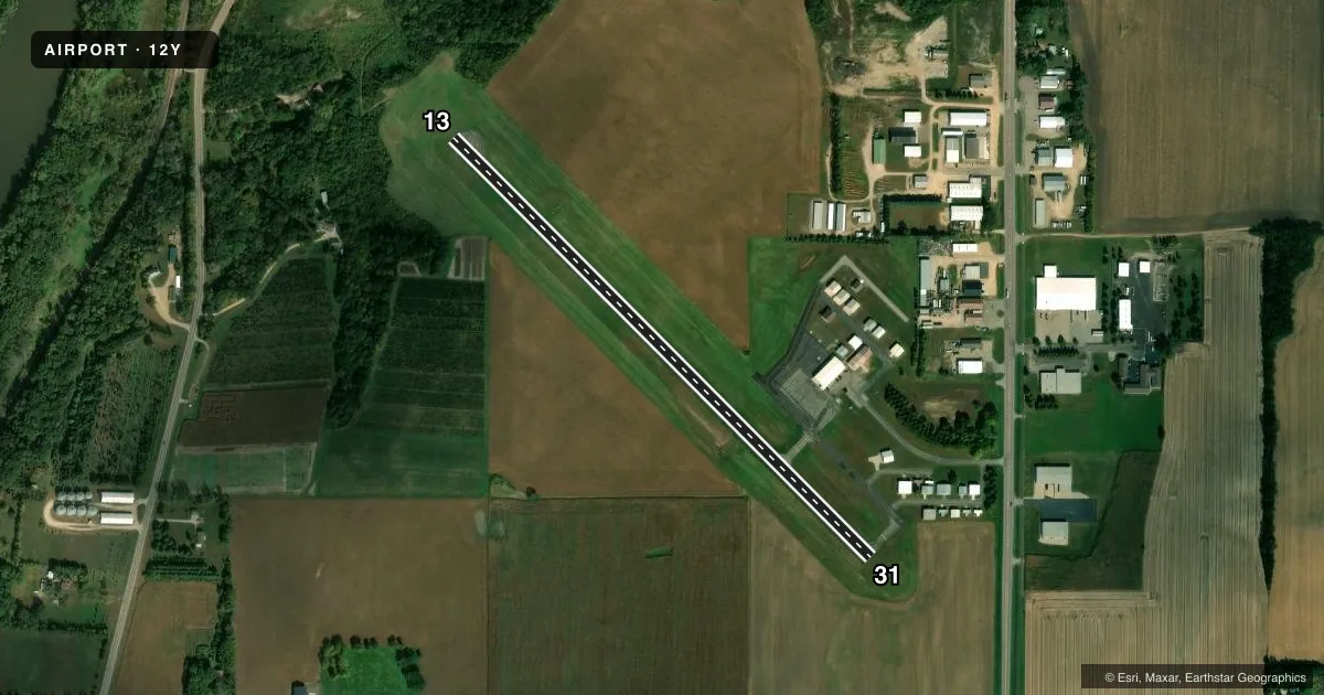 Top-down satellite sketch of 12Y LE SUEUR MUNI in LE SUEUR, MINNESOTA, showing runways 13/31 drawn to scale over Esri World Imagery