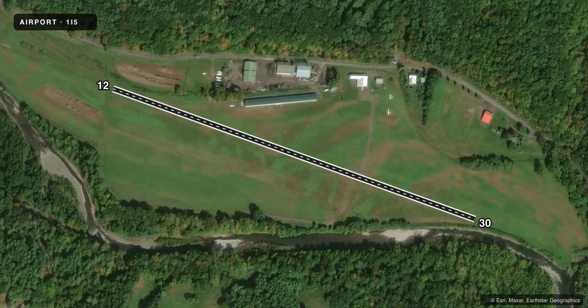 Top-down satellite sketch of 1I5 FREEHOLD in FREEHOLD, NEW YORK, showing runways 12/30 drawn to scale over Esri World Imagery