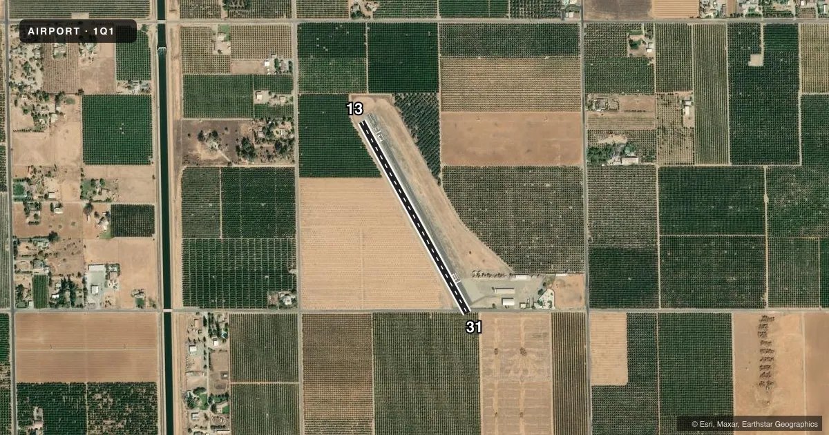Top-down satellite sketch of 1Q1 ECKERT FLD in STRATHMORE, CALIFORNIA, showing runways 13/31 drawn to scale over Esri World Imagery