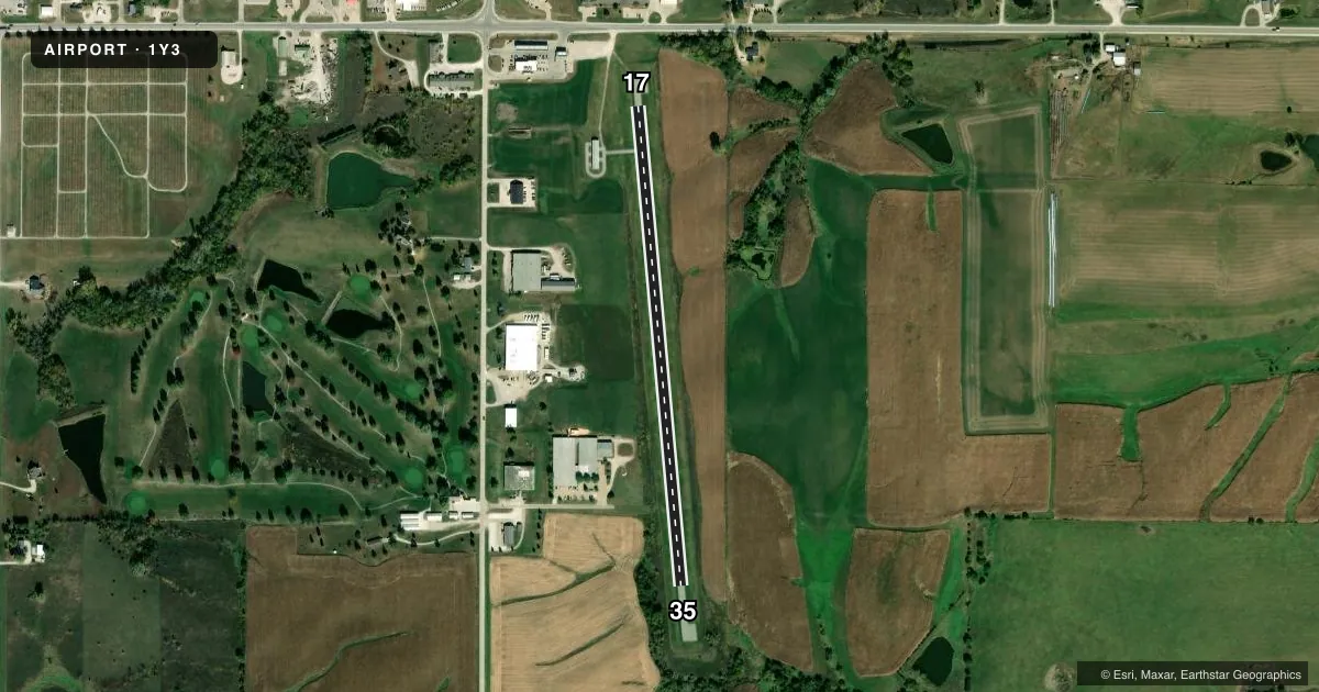 Top-down satellite sketch of 1Y3 JUDGE LEWIS FLD/MOUNT AYR MUNI in MOUNT AYR, IOWA, showing runways 17/35 drawn to scale over Esri World Imagery