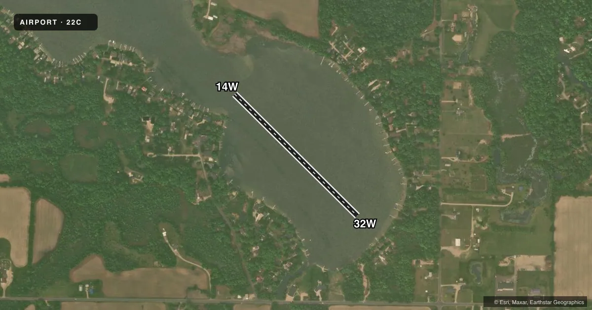 Top-down satellite sketch of 22C CLIFFORD LAKE in STANTON, MICHIGAN, showing runways 14W/32W drawn to scale over Esri World Imagery