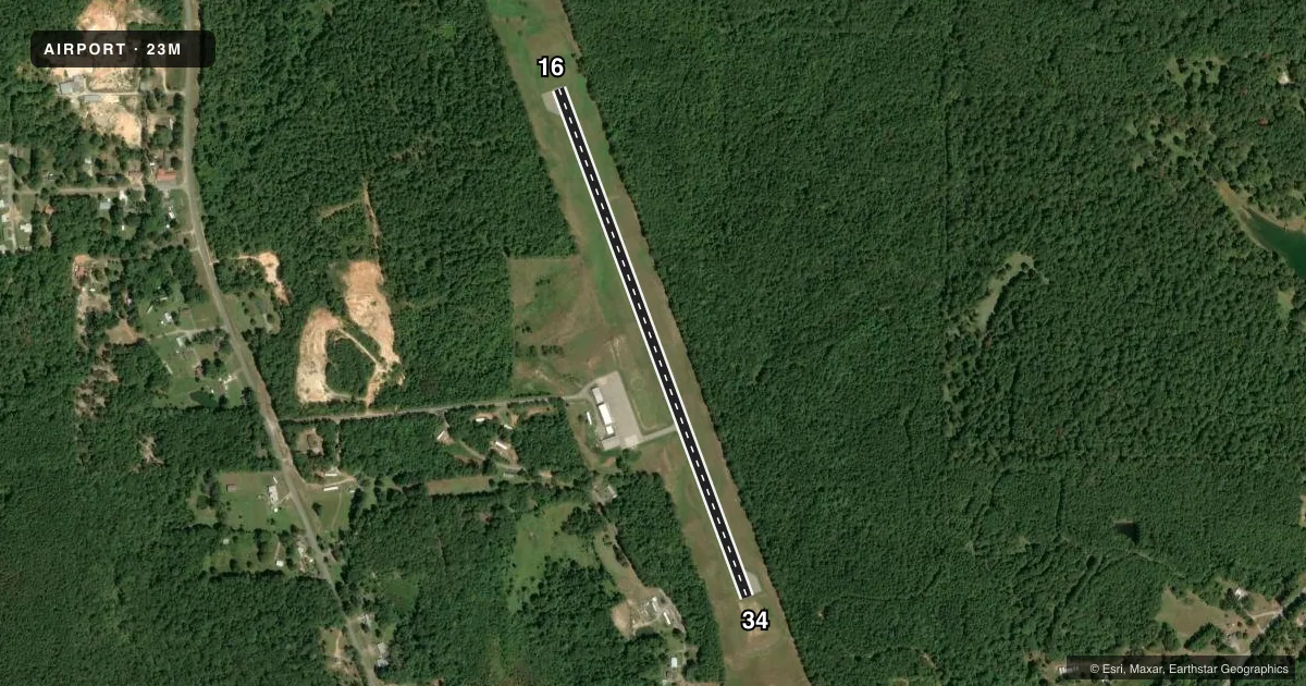 Top-down satellite sketch of 23M CLARKE COUNTY in QUITMAN, MISSISSIPPI, showing runways 16/34 drawn to scale over Esri World Imagery