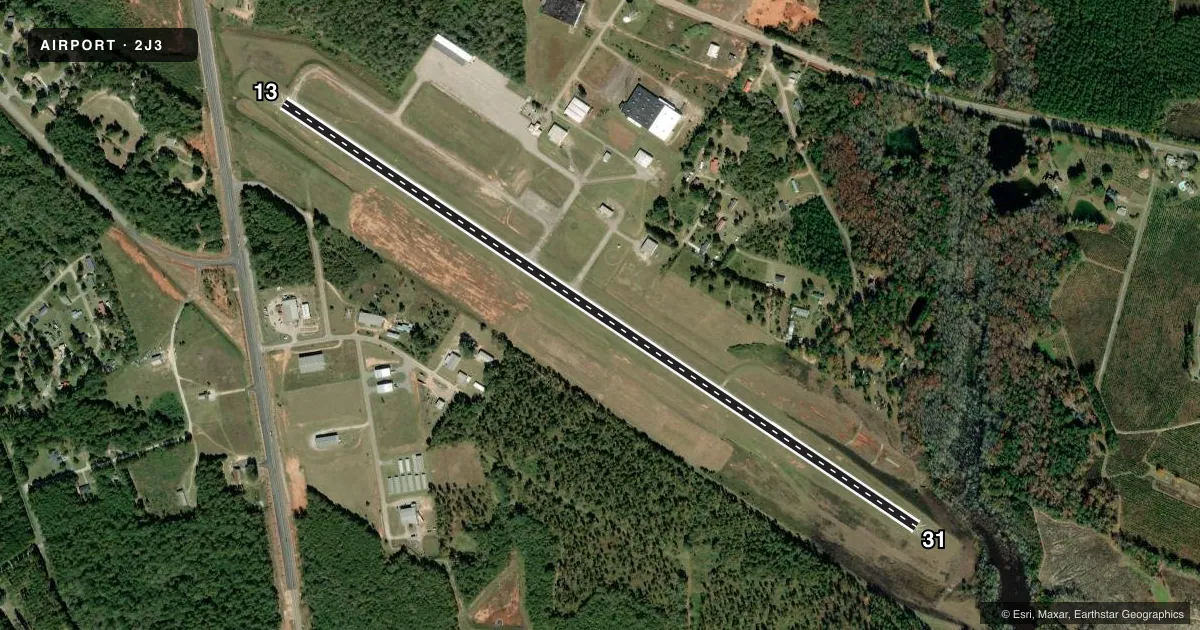 Top-down satellite sketch of 2J3 LOUISVILLE MUNI in LOUISVILLE, GEORGIA, showing runways 13/31 drawn to scale over Esri World Imagery