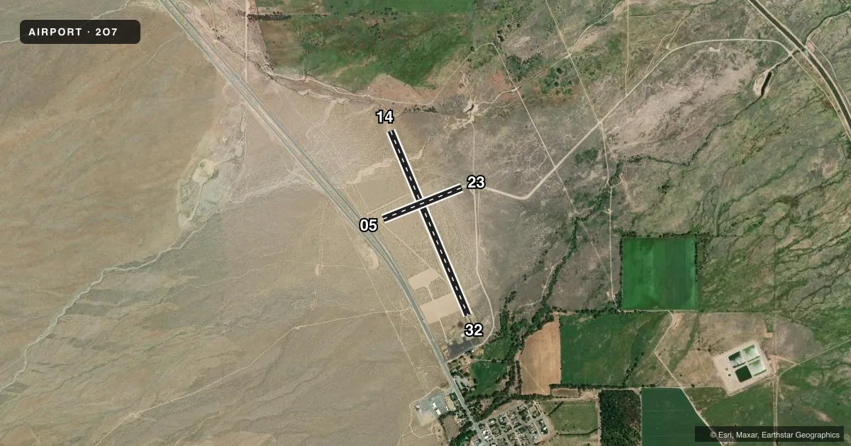 Top-down satellite sketch of 2O7 INDEPENDENCE in INDEPENDENCE, CALIFORNIA, showing runways 14/32, 05/23 drawn to scale over Esri World Imagery