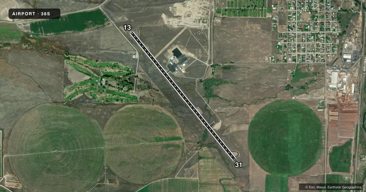 Top-down satellite sketch of 38S DEER LODGE-CITY-COUNTY in DEER LODGE, MONTANA, showing runways 13/31 drawn to scale over Esri World Imagery