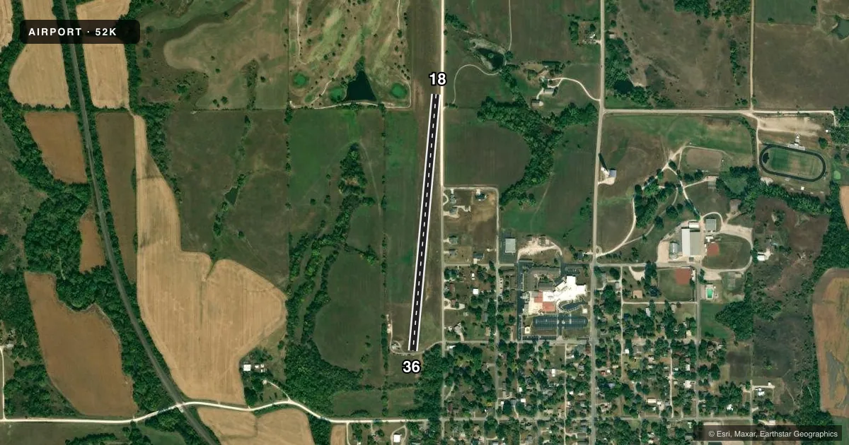 Top-down satellite sketch of 52K CHARLES E GRUTZMACHER MUNI in ONAGA, KANSAS, showing runways 18/36 drawn to scale over Esri World Imagery