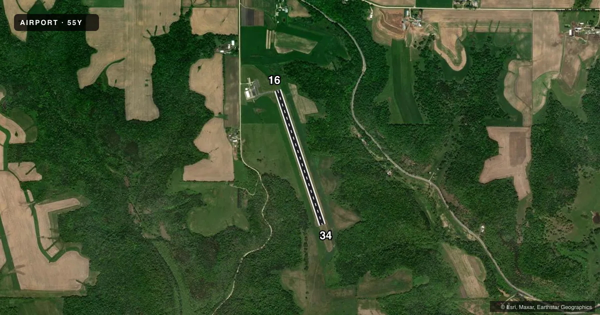 Top-down satellite sketch of 55Y RUSHFORD MUNI/ROBERT W BUNKE FLD in RUSHFORD, MINNESOTA, showing runways 16/34 drawn to scale over Esri World Imagery