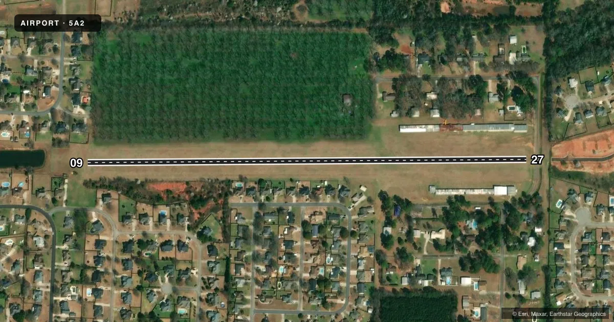 Top-down satellite sketch of 5A2 WARNER ROBINS AIR PARK in WARNER ROBINS, GEORGIA, showing runways 09/27 drawn to scale over Esri World Imagery