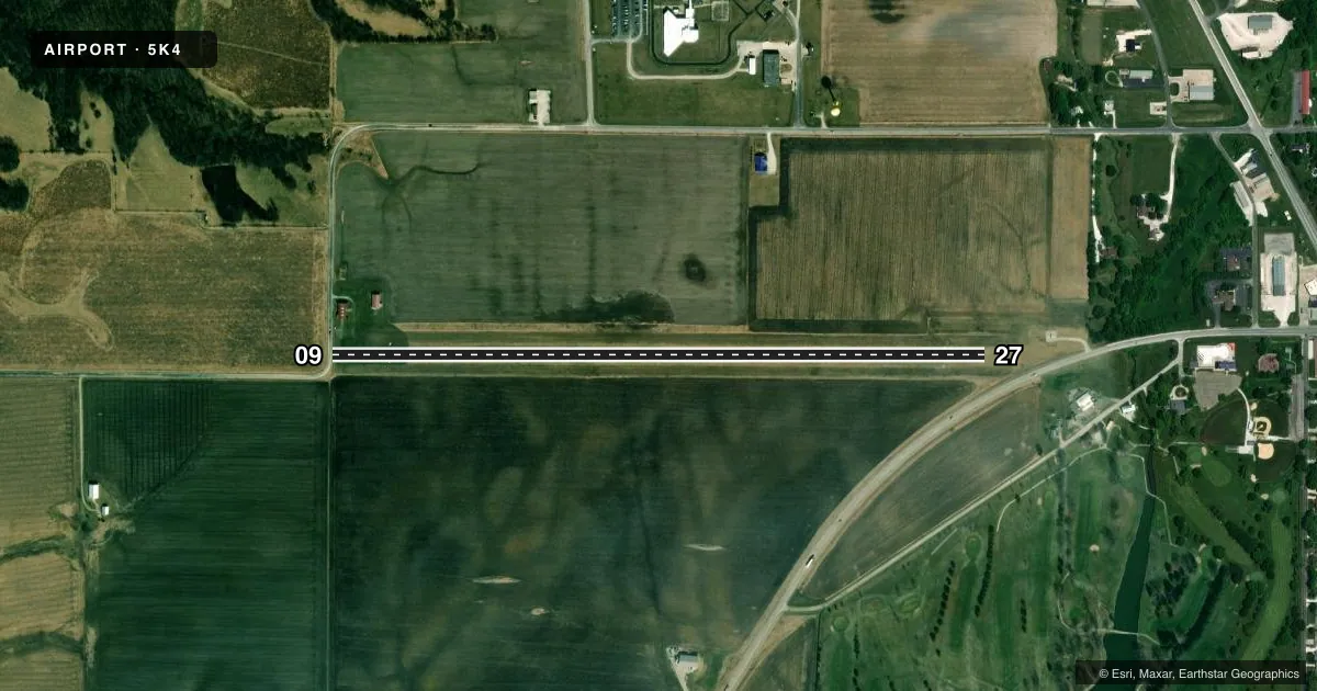 Top-down satellite sketch of 5K4 SCHUY-RUSH in RUSHVILLE, ILLINOIS, showing runways 09/27 drawn to scale over Esri World Imagery