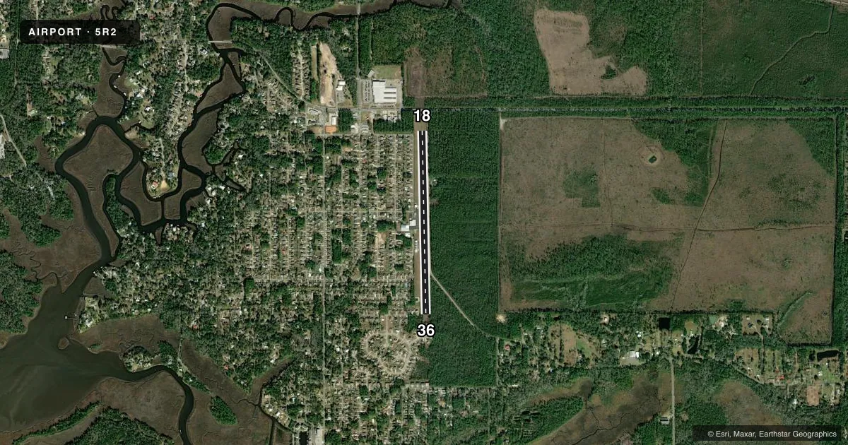 Top-down satellite sketch of 5R2 OCEAN SPRINGS in OCEAN SPRINGS, MISSISSIPPI, showing runways 18/36 drawn to scale over Esri World Imagery