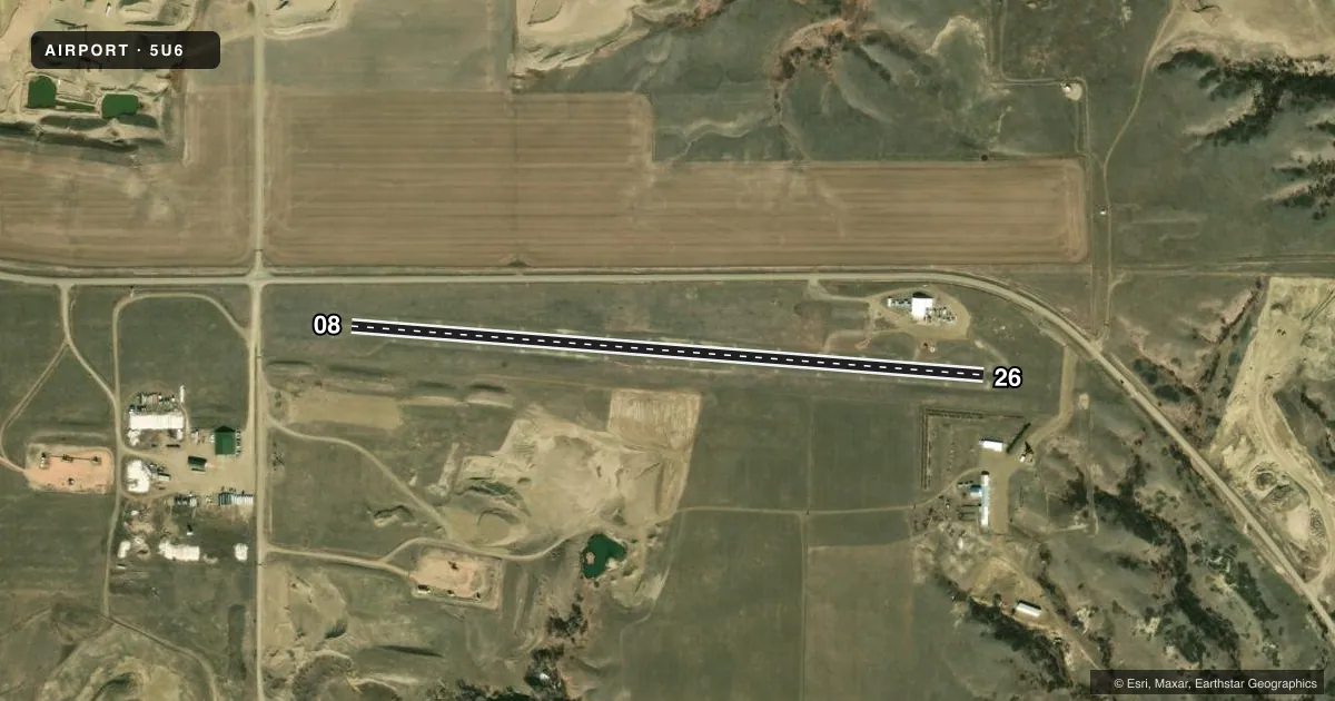 Top-down satellite sketch of 5U6 FAIRVIEW in FAIRVIEW, MONTANA, showing runways 08/26 drawn to scale over Esri World Imagery