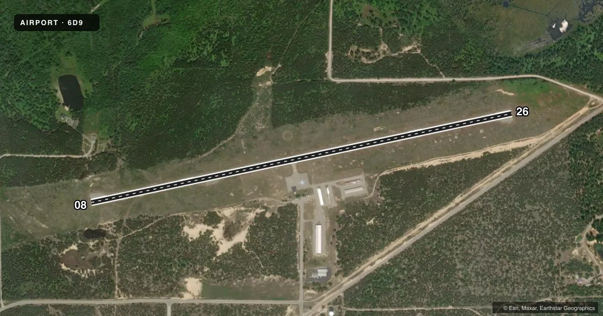Top-down satellite sketch of 6D9 IOSCO COUNTY in EAST TAWAS, MICHIGAN, showing runways 08/26 drawn to scale over Esri World Imagery