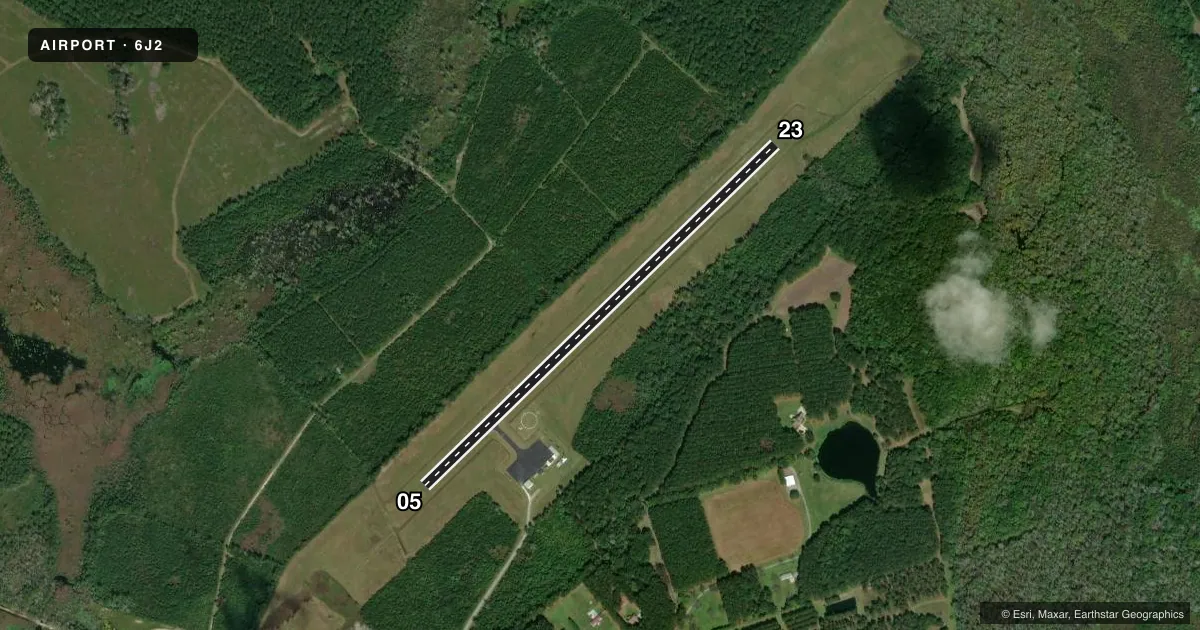 Top-down satellite sketch of 6J2 ST GEORGE in ST GEORGE, SOUTH CAROLINA, showing runways 05/23 drawn to scale over Esri World Imagery