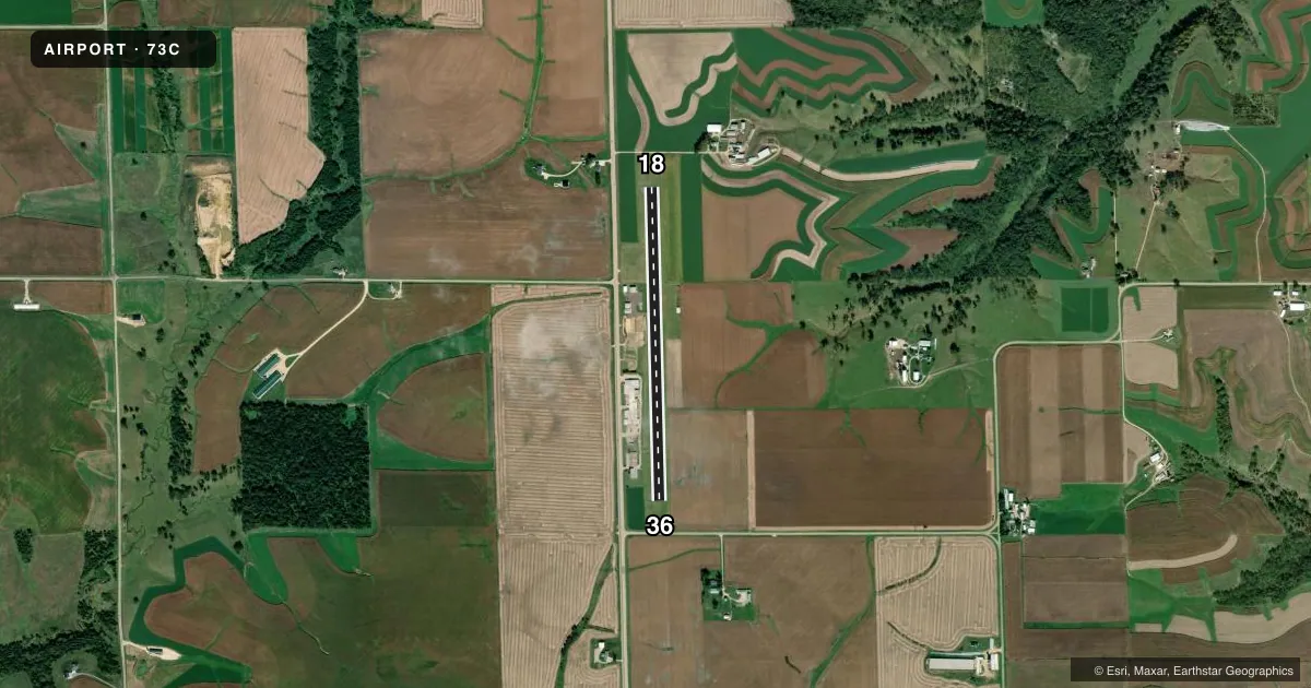 Top-down satellite sketch of 73C LANCASTER MUNI in LANCASTER, WISCONSIN, showing runways 18/36 drawn to scale over Esri World Imagery