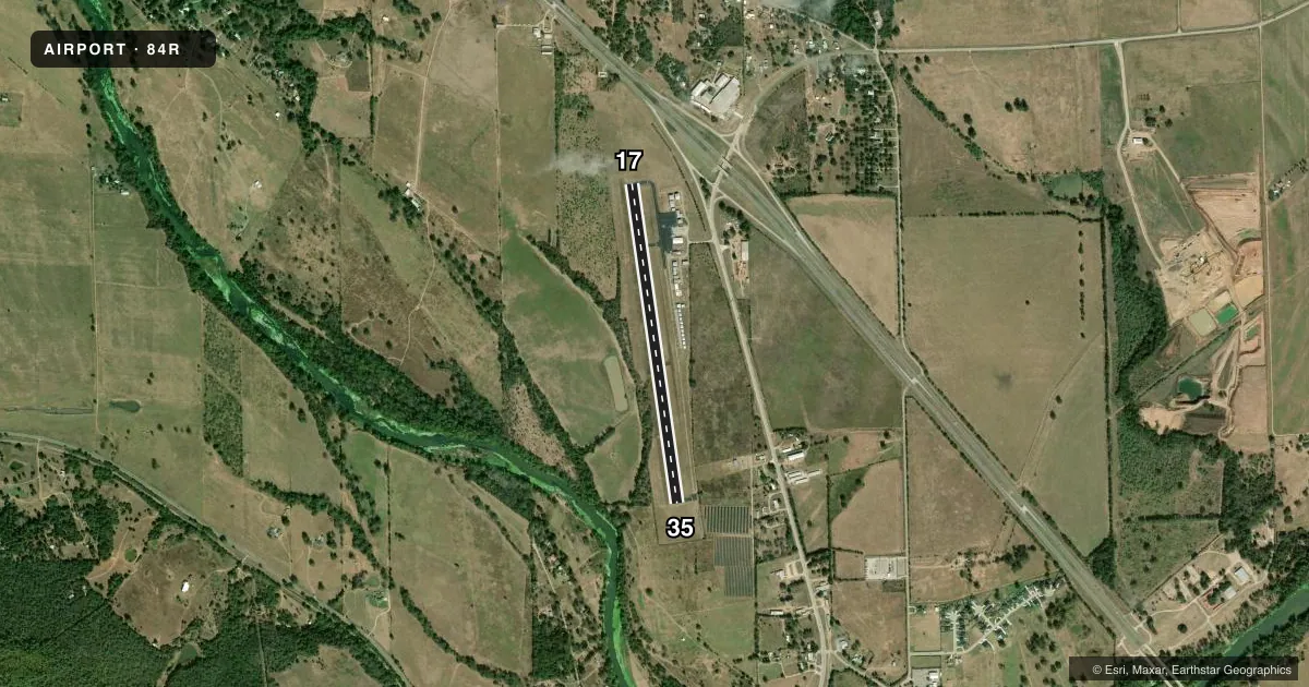 Top-down satellite sketch of 84R SMITHVILLE CRAWFORD MUNI in SMITHVILLE, TEXAS, showing runways 17/35 drawn to scale over Esri World Imagery