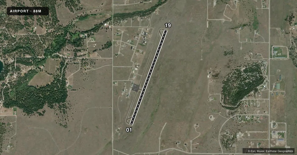 Top-down satellite sketch of 88M EUREKA in EUREKA, MONTANA, showing runways 01/19 drawn to scale over Esri World Imagery
