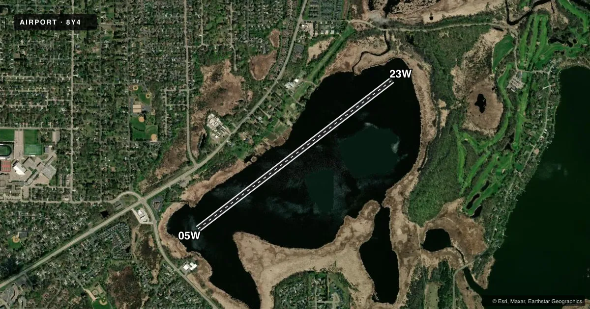 Top-down satellite sketch of 8Y4 SURFSIDE in LINO LAKES, MINNESOTA, showing runways 05W/23W drawn to scale over Esri World Imagery