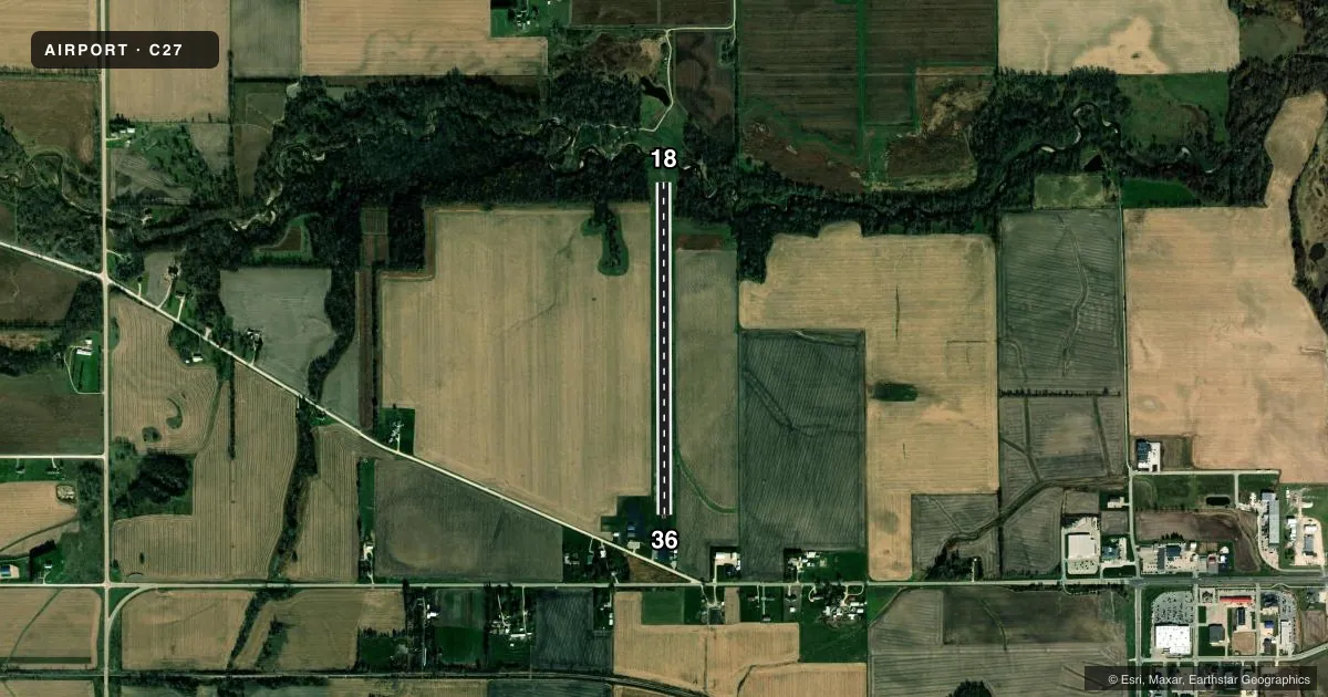Top-down satellite sketch of C27 MANCHESTER MUNI in MANCHESTER, IOWA, showing runways 18/36 drawn to scale over Esri World Imagery