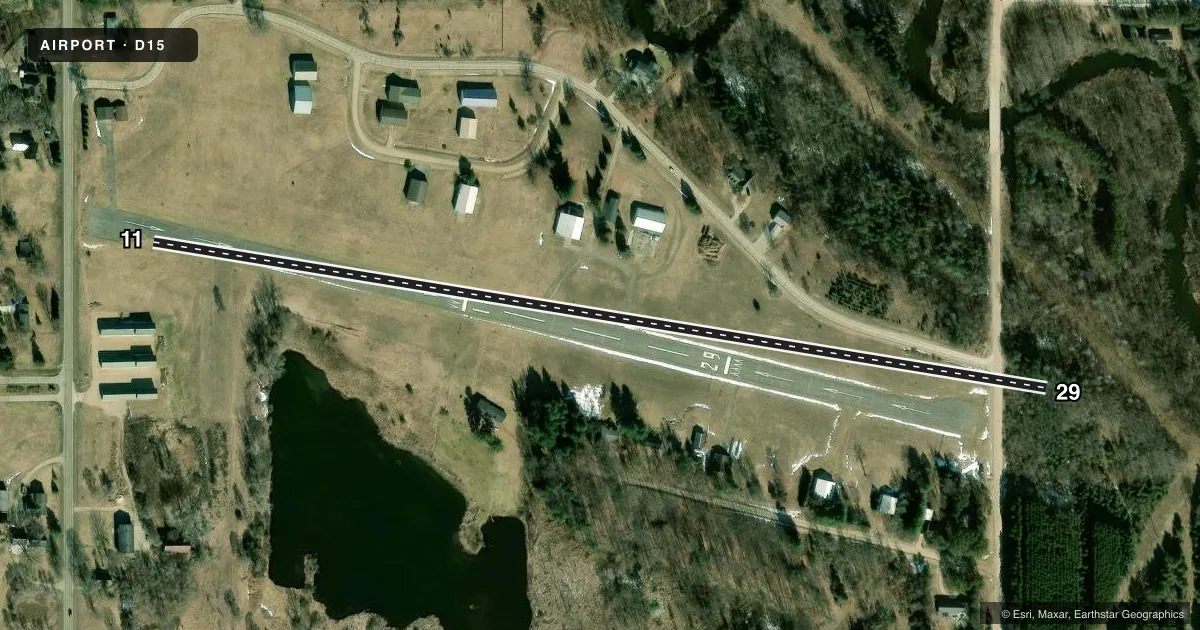 Top-down satellite sketch of D15 LAKE ISABELLA/CAL BREWER MEML in LAKE ISABELLA, MICHIGAN, showing runways 11/29 drawn to scale over Esri World Imagery