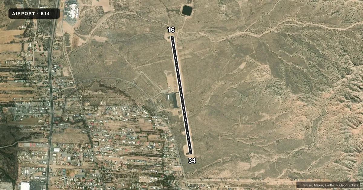Top-down satellite sketch of E14 OHKAY OWINGEH in ESPANOLA, NEW MEXICO, showing runways 16/34 drawn to scale over Esri World Imagery