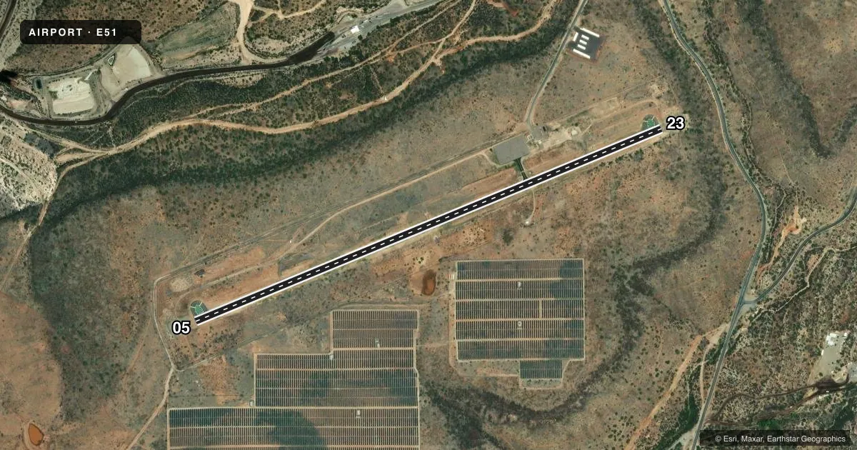 Top-down satellite sketch of E51 BAGDAD in BAGDAD, ARIZONA, showing runways 05/23 drawn to scale over Esri World Imagery