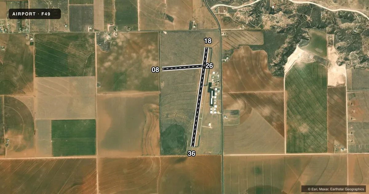 Top-down satellite sketch of F49 CITY OF SLATON/LARRY T NEAL MEML in SLATON, TEXAS, showing runways 18/36, 08/26 drawn to scale over Esri World Imagery