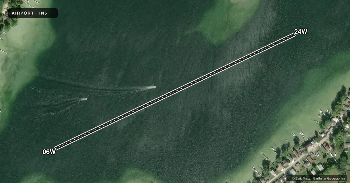Top-down satellite sketch of IN5 ADAMS LAKE in WOOLCOTTVILLE, INDIANA, showing runways 06W/24W drawn to scale over Esri World Imagery
