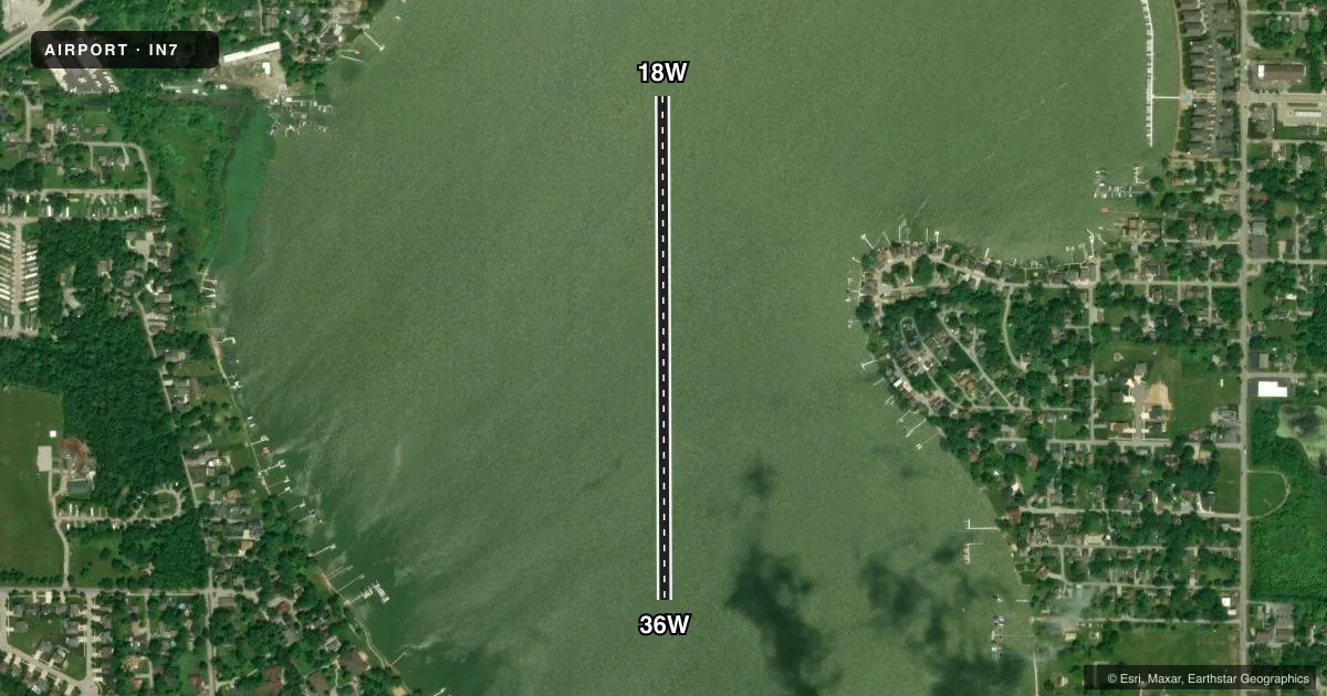Top-down satellite sketch of IN7 CEDAR LAKE in CEDAR LAKE, INDIANA, showing runways 18W/36W drawn to scale over Esri World Imagery