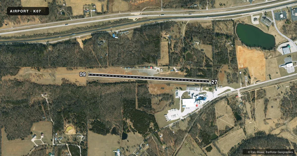 Top-down satellite sketch of K07 ROLLA DOWNTOWN in ROLLA, MISSOURI, showing runways 09/27 drawn to scale over Esri World Imagery