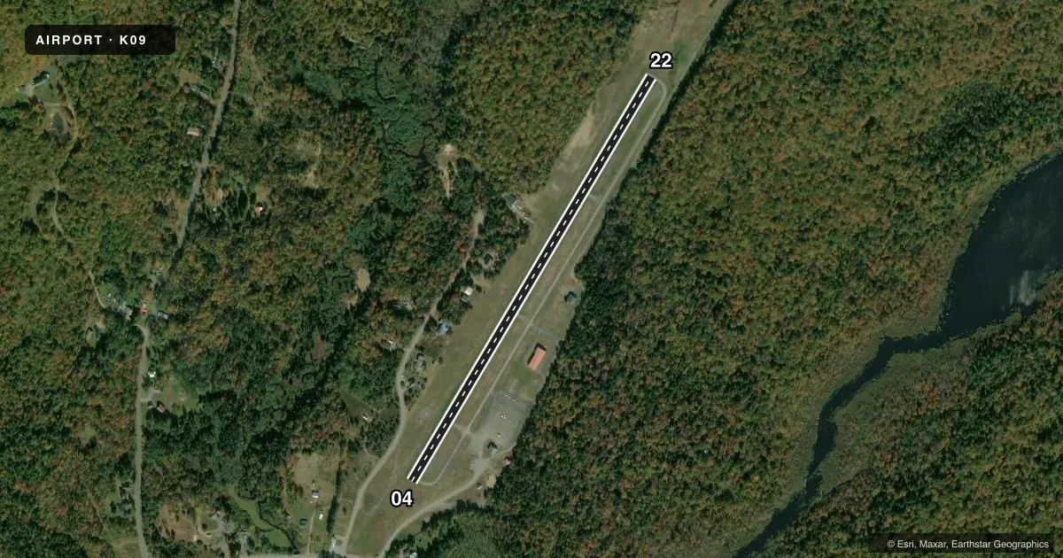 Top-down satellite sketch of K09 PISECO in PISECO, NEW YORK, showing runways 04/22 drawn to scale over Esri World Imagery