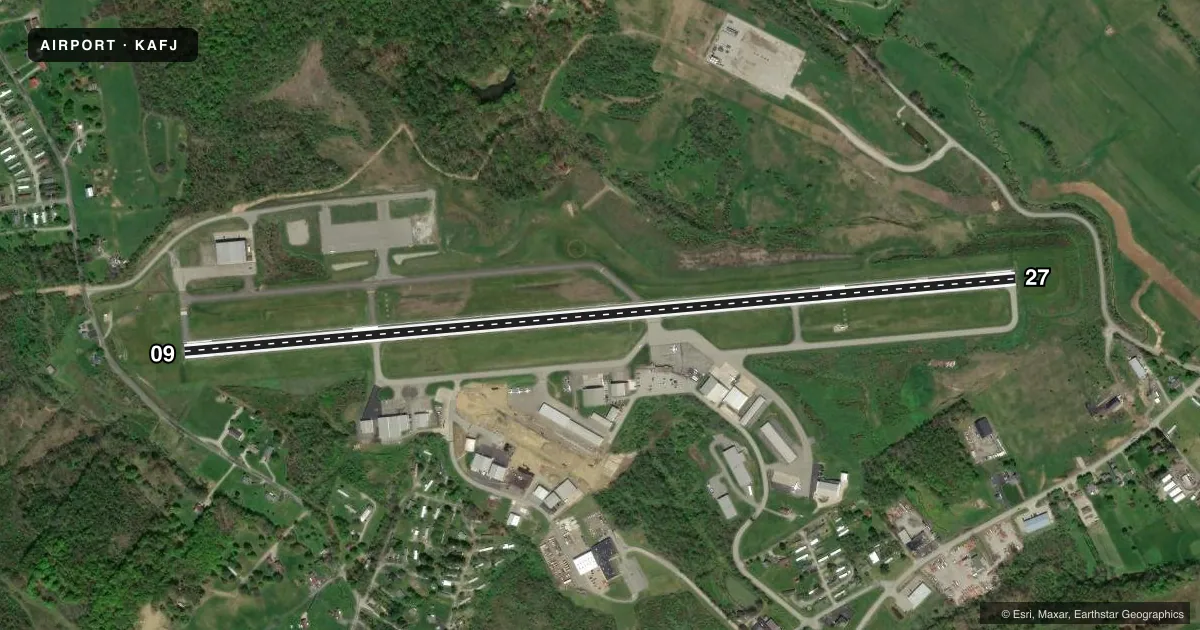 Top-down satellite sketch of KAFJ WASHINGTON COUNTY in WASHINGTON, PENNSYLVANIA, showing runways 09/27 drawn to scale over Esri World Imagery