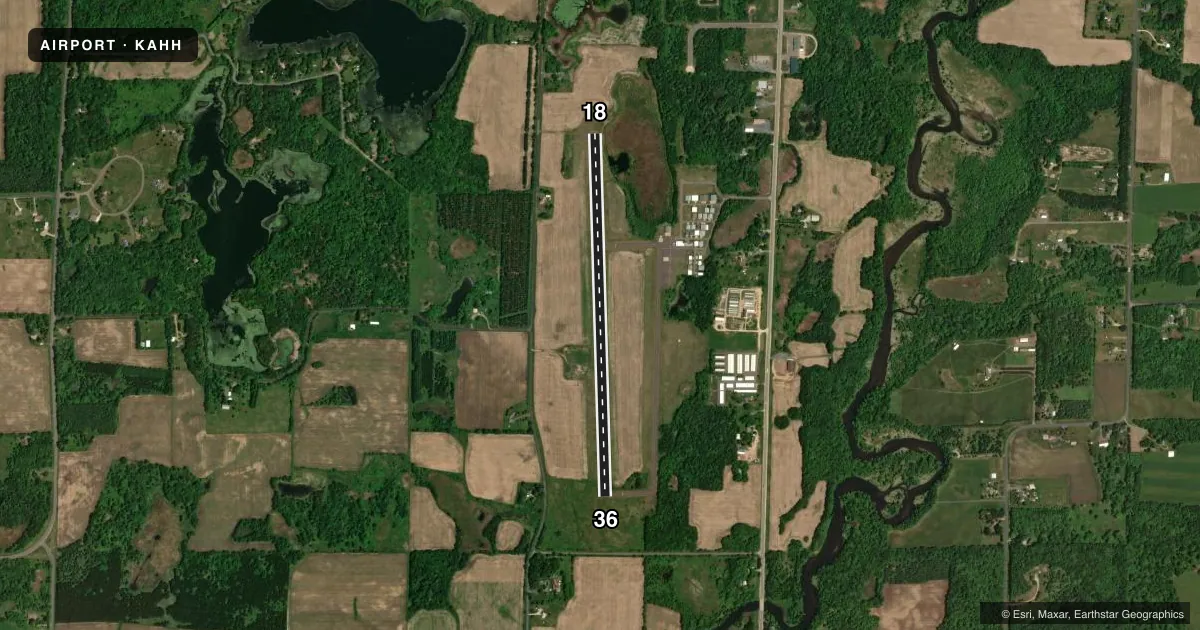Top-down satellite sketch of KAHH AMERY MUNI in AMERY, WISCONSIN, showing runways 18/36 drawn to scale over Esri World Imagery