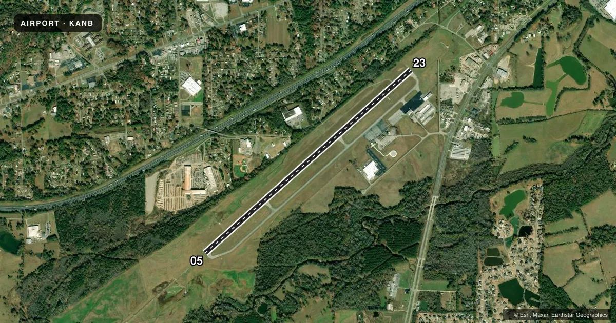 Top-down satellite sketch of KANB ANNISTON RGNL in ANNISTON, ALABAMA, showing runways 05/23 drawn to scale over Esri World Imagery