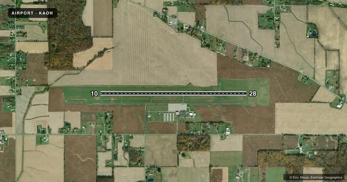 Top-down satellite sketch of KAOH LIMA ALLEN COUNTY in LIMA, OHIO, showing runways 10/28 drawn to scale over Esri World Imagery