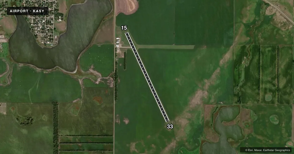 Top-down satellite sketch of KASY ASHLEY MUNI in ASHLEY, NORTH DAKOTA, showing runways 15/33 drawn to scale over Esri World Imagery