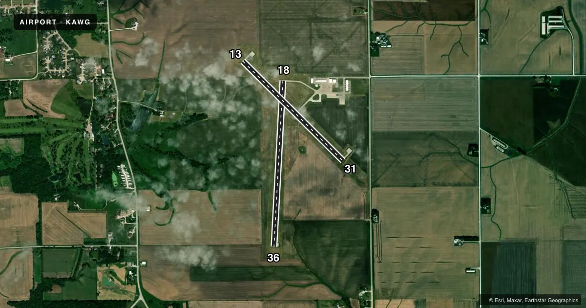 Top-down satellite sketch of KAWG WASHINGTON MUNI in WASHINGTON, IOWA, showing runways 18/36, 13/31 drawn to scale over Esri World Imagery