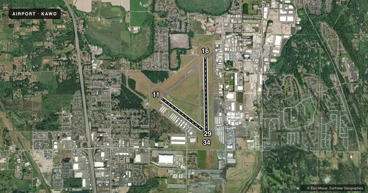 Top-down satellite sketch of KAWO ARLINGTON MUNI in ARLINGTON, WASHINGTON, showing runways 16/34, 11/29 drawn to scale over Esri World Imagery
