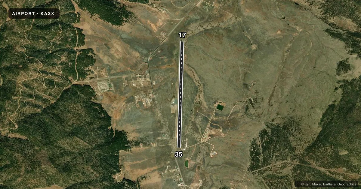 Top-down satellite sketch of KAXX ANGEL FIRE in ANGEL FIRE, NEW MEXICO, showing runways 17/35 drawn to scale over Esri World Imagery