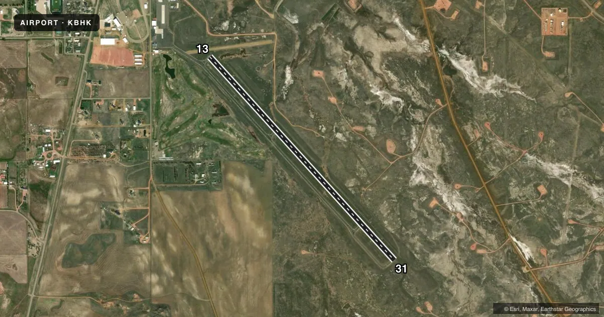 Top-down satellite sketch of KBHK BAKER MUNI in BAKER, MONTANA, showing runways 13/31 drawn to scale over Esri World Imagery