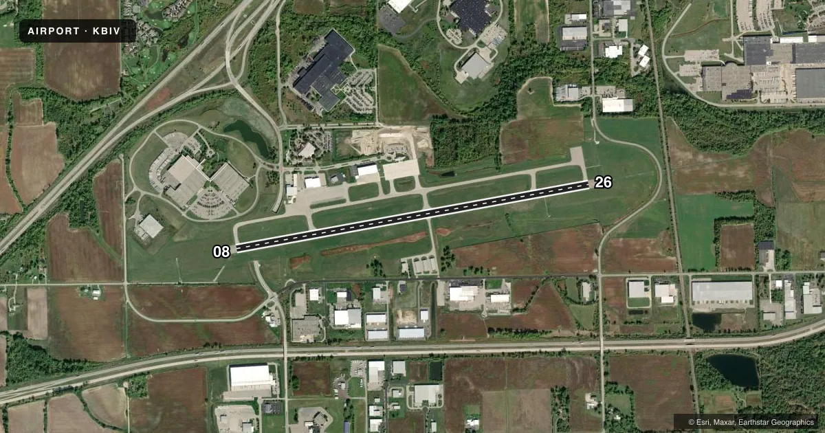 Top-down satellite sketch of KBIV WEST MICHIGAN RGNL in HOLLAND, MICHIGAN, showing runways 08/26 drawn to scale over Esri World Imagery