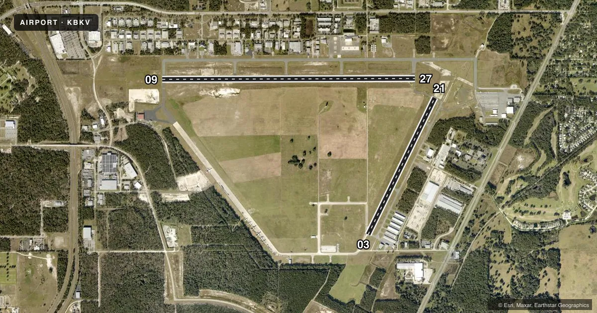 Top-down satellite sketch of KBKV BROOKSVILLE-TAMPA BAY RGNL in BROOKSVILLE, FLORIDA, showing runways 09/27, 03/21 drawn to scale over Esri World Imagery