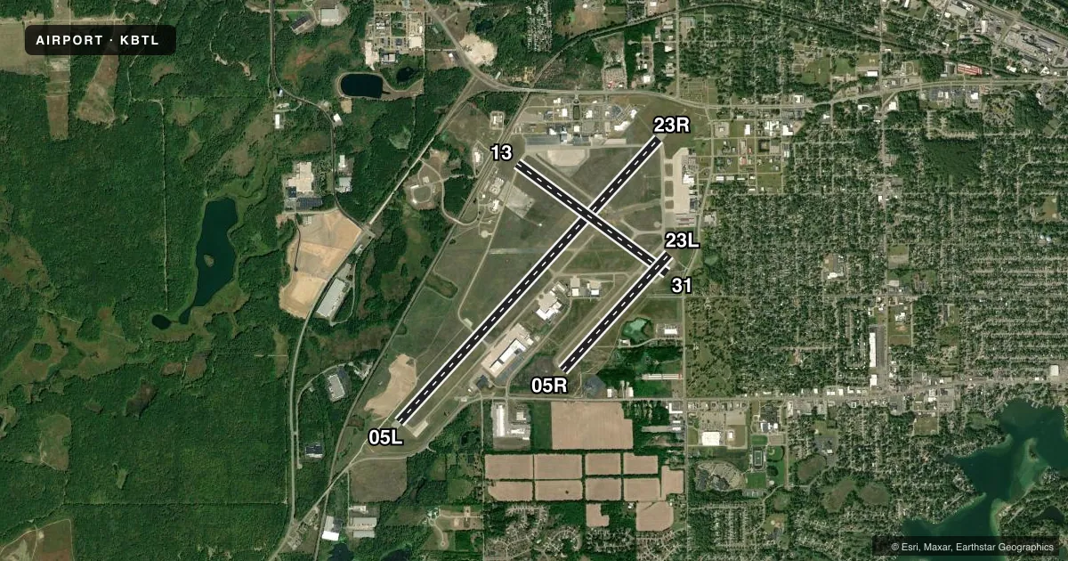 Top-down satellite sketch of KBTL BATTLE CREEK EXEC AT KELLOGG FLD in BATTLE CREEK, MICHIGAN, showing runways 05L/23R, 13/31, 05R/23L drawn to scale over Esri World Imagery
