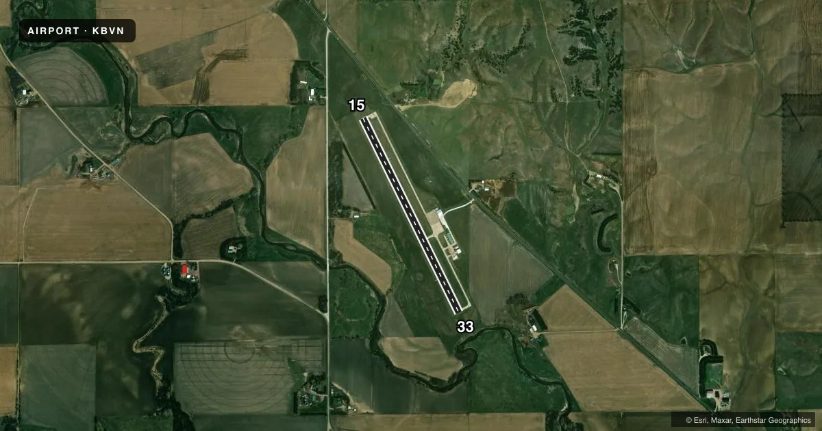 Top-down satellite sketch of KBVN ALBION MUNI in ALBION, NEBRASKA, showing runways 15/33 drawn to scale over Esri World Imagery