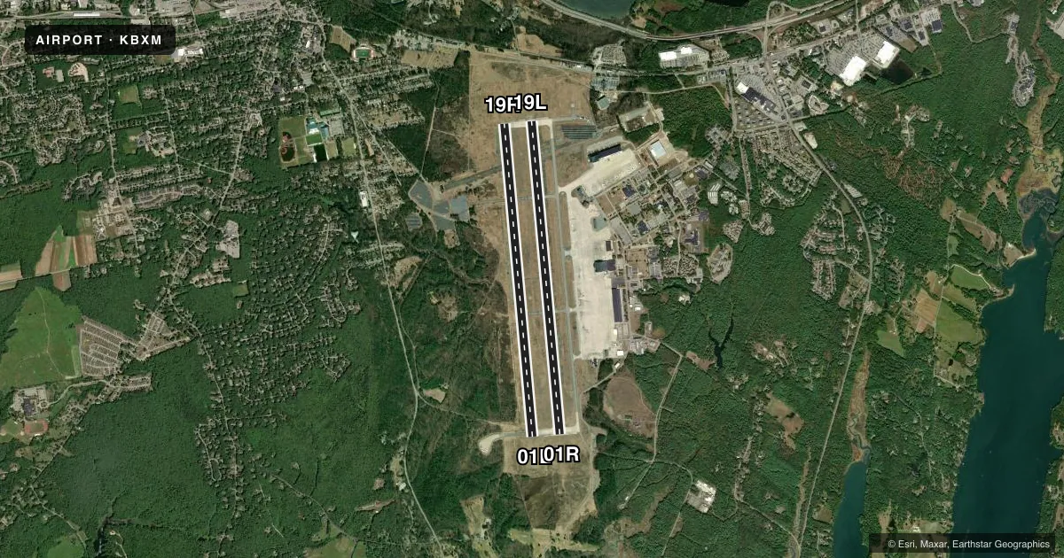 Top-down satellite sketch of KBXM BRUNSWICK EXEC in BRUNSWICK, MAINE, showing runways 01R/19L, 01L/19R drawn to scale over Esri World Imagery