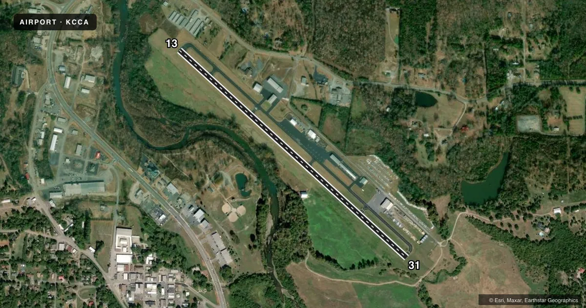 Top-down satellite sketch of KCCA CLINTON MUNI in CLINTON, ARKANSAS, showing runways 13/31 drawn to scale over Esri World Imagery