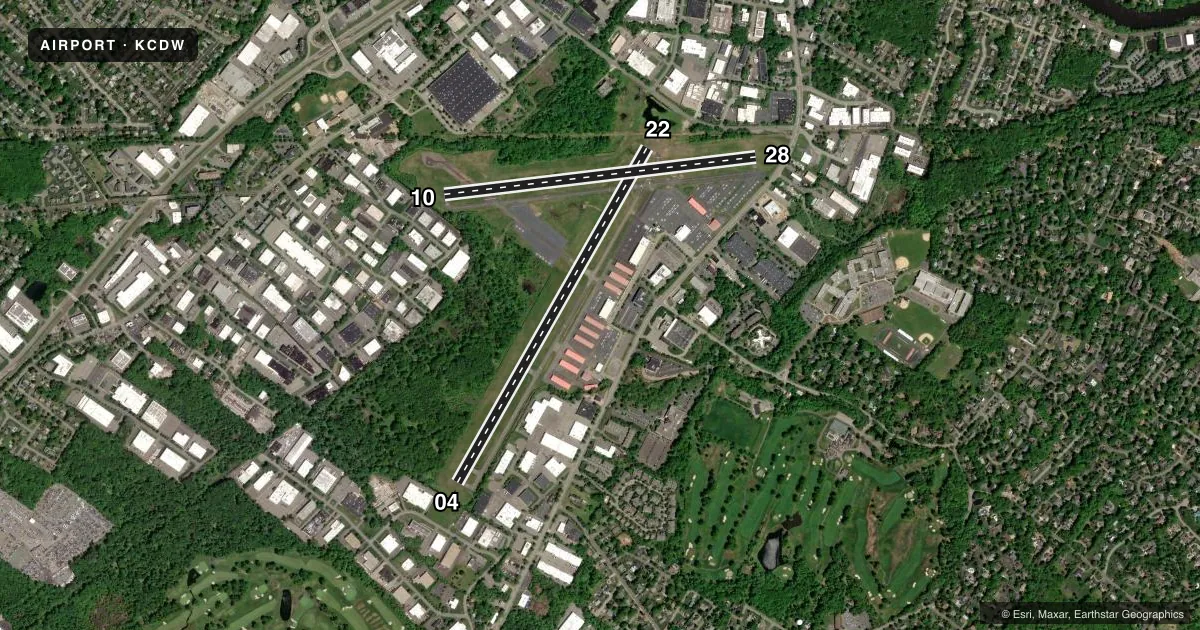 Top-down satellite sketch of KCDW ESSEX COUNTY in CALDWELL, NEW JERSEY, showing runways 04/22, 10/28 drawn to scale over Esri World Imagery
