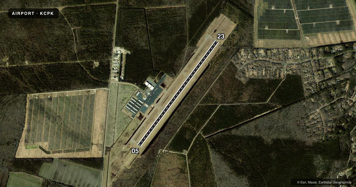 Top-down satellite sketch of KCPK CHESAPEAKE RGNL in NORFOLK, VIRGINIA, showing runways 05/23 drawn to scale over Esri World Imagery